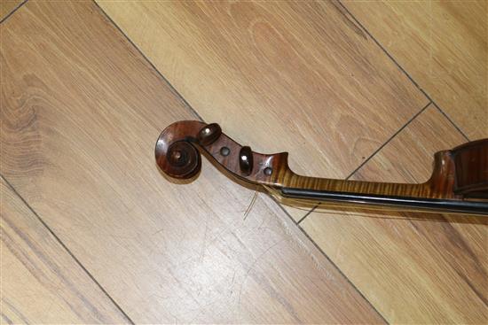 A 19th century violin by Louis Jolly, with bow cased Length 62cm